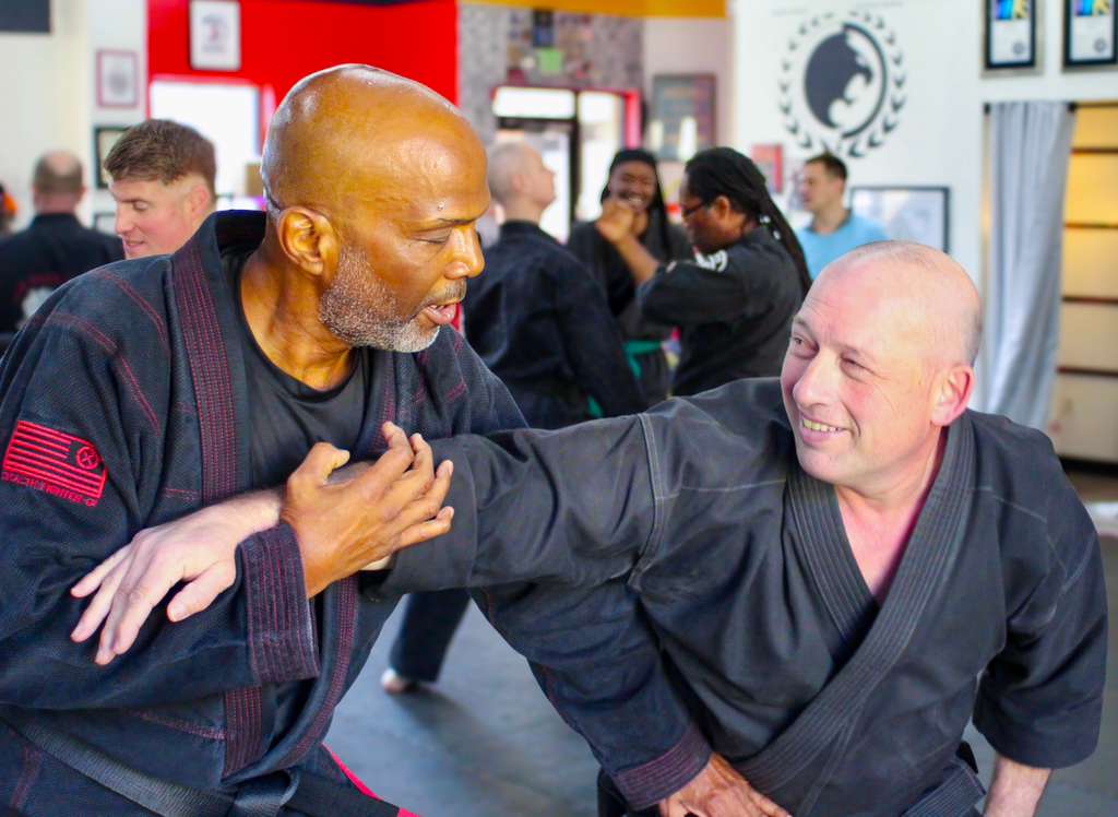 Wing Chun students practicing centerline striking technique at Burning Tree MMA